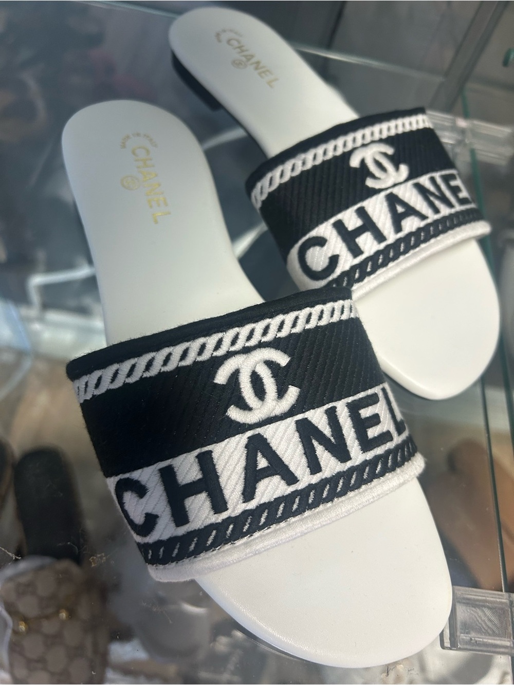 White and black embroidered slides